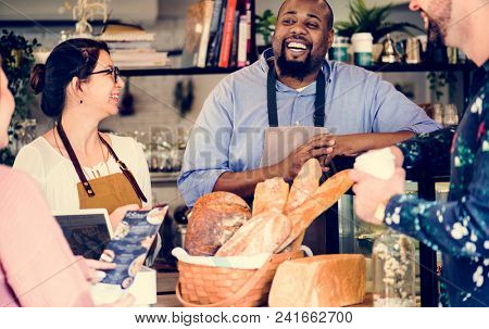 Customer ordering pasrty at counter