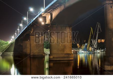 Brooklyn Bridge At Night With Water Reflection, New York City Skyline