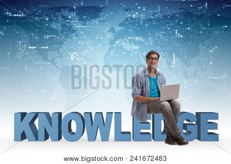 Young man in telelearning concept with laptop and books