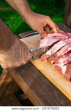 Overhead View Of Raw Piece Of Pork On Wooden Background. Piece Of Fresh Boneless Pork, Neck Part Or 