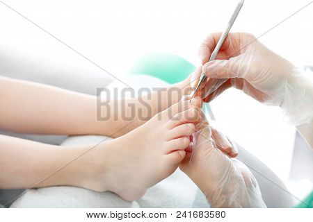 Podiatry. The Doctor Develops A Toenail. The Surgeon Cuts His Toenail