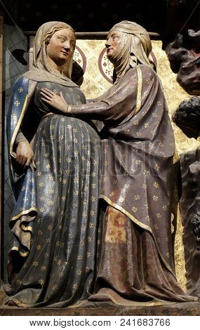 PARIS, FRANCE - JANUARY 04: Intricately carved and painted frieze inside Notre Dame Cathedral depicting Visitation of the Virgin Mary, UNESCO World Heritage Site in Paris, France on January 04, 2018.