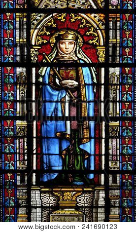 PARIS, FRANCE - JANUARY 05: Saint Radegund, stained glass window in the Basilica of Saint Clotilde in Paris, France on January 05, 2018.