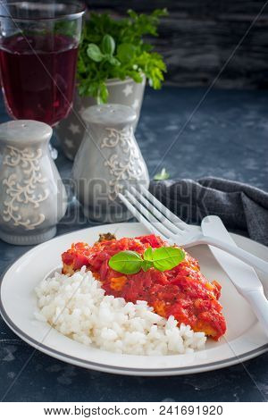 Flounder With Tomato Sauce And Boiled Rice, Selective Focus