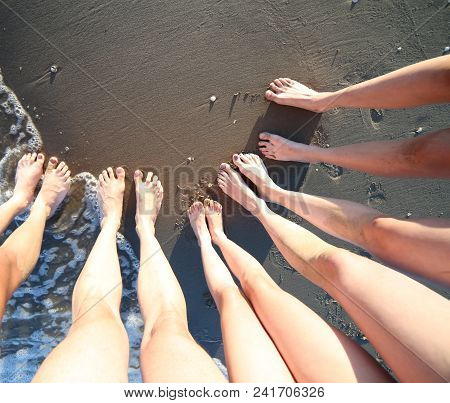 Ten Barefoot Feet Of A Family Of Five With Mum Dad And Three Children