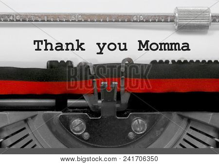 Thank You Momma Phrase Written By An Old Typewriter On White Sheet