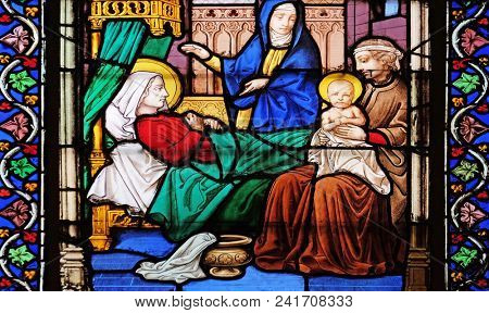 PARIS, FRANCE - JANUARY 10: Birth of the Virgin Mary stained glass windows in the Saint Eugene - Saint Cecilia Church, Paris, France on January 10, 2018.