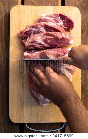 Overhead View Of Raw Piece Of Pork On Wooden Background. Piece Of Fresh Boneless Pork, Neck Part Or 