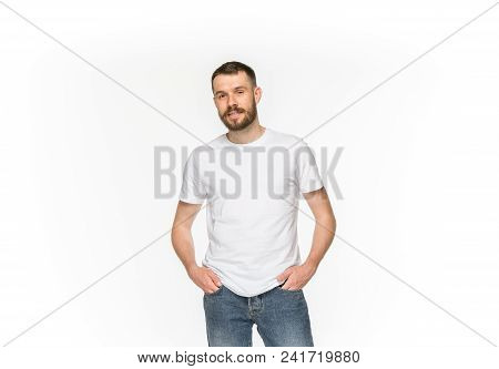 Closeup Of Young Man's Body In Empty White T-shirt Isolated On White Background. Mock Up For Disign 