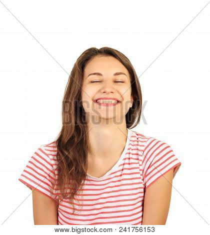 Portrait Of An Attractive Smiling Young Brunette Woman. Emotional Gloat Girl Isolated On White Backg
