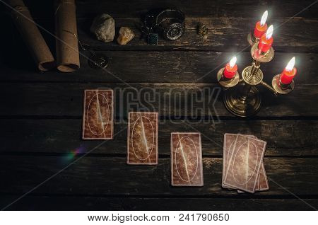 Tarot Cards On Fortune Teller Desk Table Background. Futune Reading Concept.