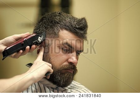 Handsome Man Face. Barber And Hairdresser. Man Cut Long Beard And Mustache With Trimmer Razor. Hairc