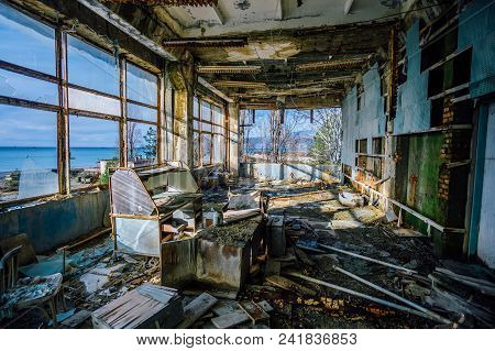 Old Rotten Workshop At Abandoned Factory Of Components For Submarine Torpedoes.
