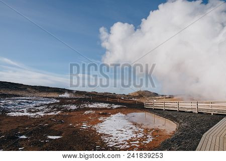 Majestic View Of Wooden Walkway And Geothermal Hot Springs In Iceland, Gunnuhver Hot Springs, Reykja