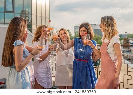 Girls Party. Beautiful Women Friends Having Fun At Bachelorette Party. They Are Celebrating And Drin