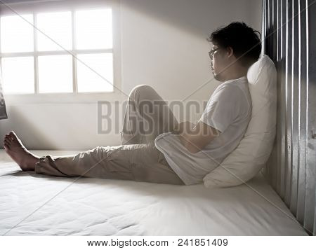 Lonely Sad Young Asian Man Suffering From Severe Depression