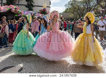 Funchal; Madeira; Portugal - April 19; 2018: Women In Colorful Costumes On Avenida Arriaga At The Ma