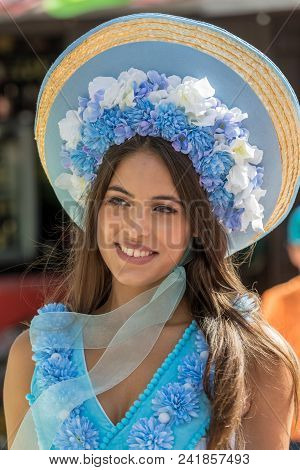 Funchal; Madeira; Portugal - April 19; 2018: Womn In Colorful Costumes On Avenida Arriaga At The Mad