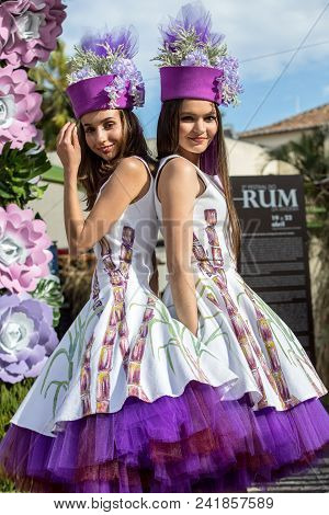Funchal; Madeira; Portugal - April 19; 2018: Women In Colorful Costumes On Avenida Arriaga At The Ma