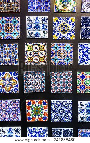 Magnets of typical portuguese tiles for sale in a souvenir shop