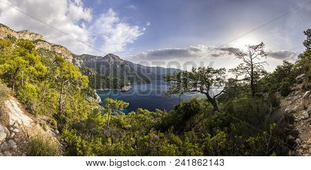 Panorama Of Mountains Covered By Forest Near Mediterranean Sea At Sunset