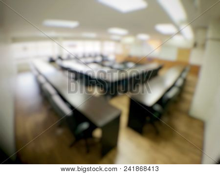 Blurred Image Of Empty  Meeting Room, Conference Room, Board Room With Rustic Wooden Flooring, Meeti