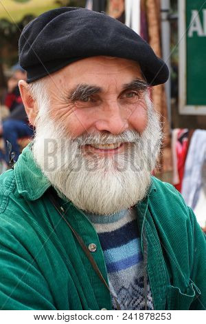 Chisinau, Moldova- April, 03, 2010.  Portrait Of An Unknown Artist  At The Open Air Artist Market. C