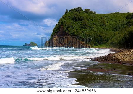 Waves Crashing Onshore To The Rural Pololu Beach Surrounded By A Lush Tropical Forest And The Pacifi
