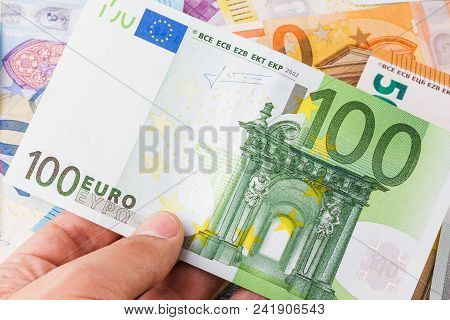 100 Euro Banknote In A Mans Hand. Euro Money.