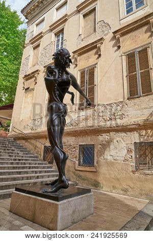 FIGUERES, GIRONA/SPAIN - JULY 22, 2017: Dali sculpture tribute to Isaac Newtonin in Baixada Mercer street at Figueres near museum at Catalonia