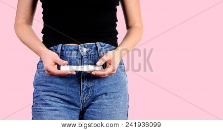 Pregnant Test. Woman Holdinj A Positive Pregnancy Test
