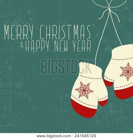 Merry Christmas And Happy New Year Card With Gloves On Color Grune Background With Snow