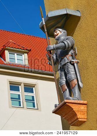 NORDHAUSEN, THURINGIA/GERMANY - JULY 13, 2017: The Riesenhaus a stately half-timbered building on Holzmarkt adorned by the Nordhausen Giant destroyed in 1945 II World War now rebuilded