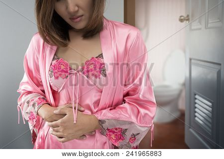 The Woman In Pink Satin Robe Wake Up For Go To Restroom, Asian People Have A Stomach Ache, Inflammat