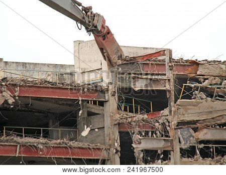 Debris Being Pulled From A Building Demolition Site.