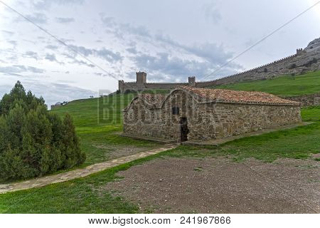Genoese Fortress In Sudak, Crimea. Cloudy Day, Early April.