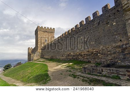 Genoese Fortress In Sudak, Crimea.the Citadel And The Wall Of The Upper Tier Of Defense. Cloudy Day,