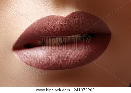 Close-up Female Lips With Fashion Natural Coffee Lipstick Makeup. Macro Sexy Lip Stick Make-up