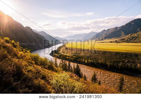 Incredible Landscape Of Altai Mountain Valley With River At Sunset. Altai Mountains Landscape.