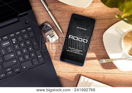 Smartphone Lies On Desk With Rodo Sign On Display. Conception Of  General Data Protection Regulation