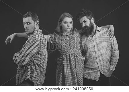 Men, Woman On Pensive Faces, Black Background. Company Of Confident People, Friends. Love Triangle C