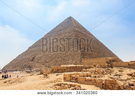 The Ancient Egyptian Pyramid Of Khufu With Ruins, Tombs And Monuments In Giza, Cairo, Egypt