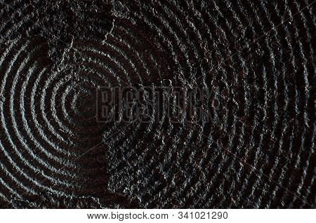 Macro Of Old And Damaged Metal Heating Element From Electric Range. Surface Layers Peeling Away.