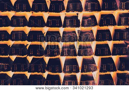Stack Of Concrete Railroad Ties. Abstract Processing. Dark Violet And Warm Orange Colors