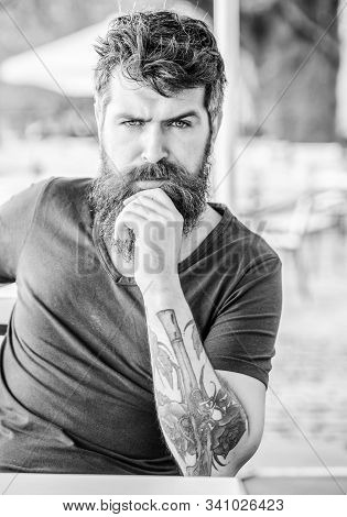 Portrait Of Brutal Handsome Male Model. Waiting And Tinking. Thoughtful Man Outdoor. Facial Skin Car