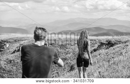 Young Adventurers. Travel Together With Darling. Couple Taking Photo. Couple In Love Hiking Mountain