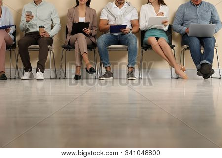 People Waiting For Job Interview In Office, Closeup