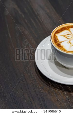 Beautiful Cappuccino Froth Milk Pattern Coffee On Wooden Table