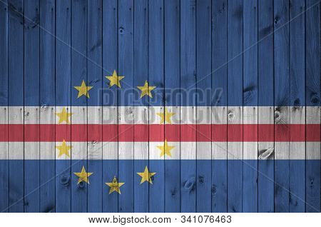 Cabo Verde Flag Depicted In Bright Paint Colors On Old Wooden Wall. Textured Banner On Rough Backgro