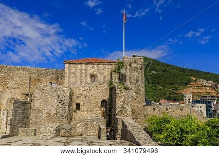 Picturesque Stone Walls Of The 15th Century Citadel In The Old Town In Budva Montenegro In The Balka